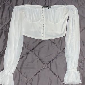 a long sleeve , crop top shirt